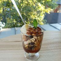 sweet and salty vegan ice cream with lots of nuts and caramel sauce at Strh Cafe & Gallery in Zakopane