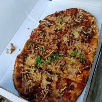 Pinsa Seitan veganer Käse ToGo at Veggie Liebe in Freiburg