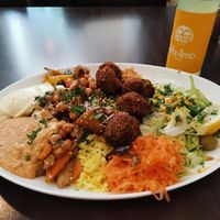 Falafel plate with hummus and honey-mustard-dip (not vegan, everything clearly labeled). at Veggie Liebe in Freiburg