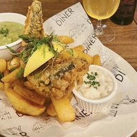 Tofish & chips with mushy peas and a cider  at Unity Diner in East London