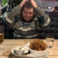 Losing our minds over the amazing Mac and cheese balls!  at Unity Diner in East London