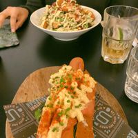Supreme Dog and Chikken Caesar Salad with Bakon at Unity Diner in East London