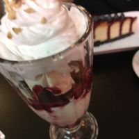 Peanut Butter and Jam Sundae and Cheesecake in the background  at Unity Diner in East London