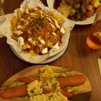 hotdog with mac&cheese, dirty loaded fries, christmas roast at Unity Diner in East London