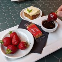 The strawberry & chocolate dip dessert in front, the orange & carotcake in the back at Milano in Galway
