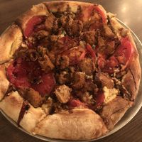 Vegan caprese pizza with Beyond Meat sausage  at Firepit in Atlanta