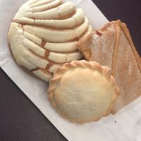 Conchas, apple pastry, and some mystery pineapple pie at Panaderia Cuscatleca in Los Angeles