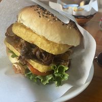 Mushroom burger with extra tofu at Maya Burger Queen in Pai