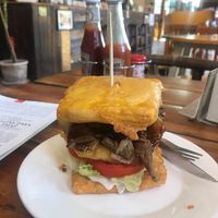 Mushrooms and pineapple between battered tofu  at Maya Burger Queen in Pai