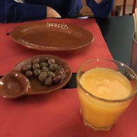 fresh OJ and olives   at Do Vigário Pub and Records in Lisbon
