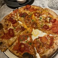 Vegan Forza. Couldn’t resist taking a bite before pic!  at Pizza Express - St Helier in Jersey