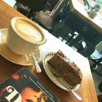 Fig and walnut cake with almond mylk cappuccino  😍 at Coffee Circus in Bugibba