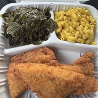 Cajun fried chicken with collard greens and mac & cheese  at Senbeb Cafe in Washington
