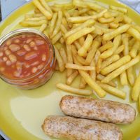 Sausage, beans and chips (July 2022) at Pyramid Vegan Cafe & Bakery in Glastonbury