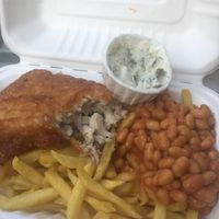 A tasty meal of Vish & Chips with beans & tartare sauce - very greasy but a lovely treat with excellent textures and flavours.  at Pyramid Vegan Cafe & Bakery in Glastonbury