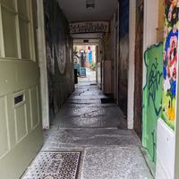 The passage entrance from high street at Pyramid Vegan Cafe & Bakery in Glastonbury