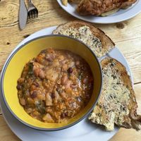 Casserole and garlic sourdough  at Pyramid Vegan Cafe & Bakery in Glastonbury