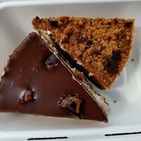 Biscoff cheese cake and date, chocolate and banana cheesecake to go! at Pyramid Vegan Cafe & Bakery in Glastonbury