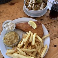 Vish and chips with tartare sauce and curry sauce. And kebab loaded chips. Both lovely!   at Pyramid Vegan Cafe & Bakery in Glastonbury