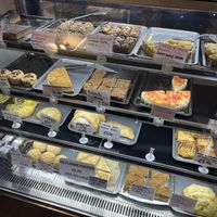Counter with lots of savoury and sweet options  at Pyramid Vegan Cafe & Bakery in Glastonbury