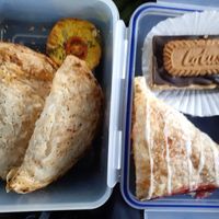 Vegan cheese and onion pasties, crustless quiche, turnover and lotus bar at Pyramid Vegan Cafe & Bakery in Glastonbury