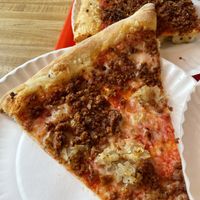 Special vegan slice and deep sausage pizza  at Paulie Gee's - Slice Shop in Brooklyn