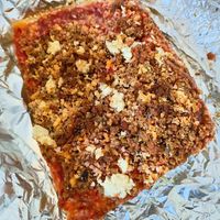 Vegan Freddy Prince with vegan sausage and added fresh garlic (which it didn't need!) Forgot to take pix while it was hot, but next day cold slice is yummy too! at Paulie Gee's - Slice Shop in Brooklyn