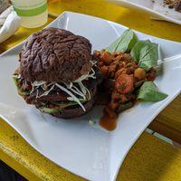Black bean burger on a pumpernickel roll. at Lion's Share Cafe in Bridgetown
