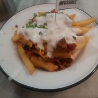 Impossible chilli cheese fries at HKG - Beef & Liberty Burgers - T1 in Outlying Islands
