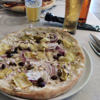 Pizza "3 stagioni" with vegan cheese! at Hotel Europa in Molveno