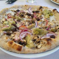 Pizza veg tre stagioni con impasto integrale. at Hotel Europa in Molveno