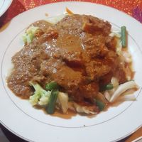 Try the Gado Gado peanut sauce dish. It doesn't look appetizing in the pic but it is so delicious!! at Rosalies in Samosir