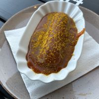 Curry Wurst in curry sauce  at Apple & Eve in Hamburg
