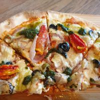 Mediterranean pizza has thin crispy base at The Vegan Table in Phuket