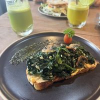 Spinach and mushrooms tartine  at The Vegan Table in Phuket