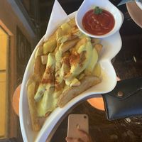 Fries with melted cheese at The Vegan Table in Phuket