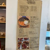 Wall menu for food at Harper's Juice & Coffee in Buenos Aires