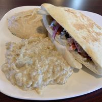 Falafel Sandwich with sides of hummus & baba ghanoush at Odeh's Mediterranean Restaurant in Elko