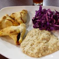 spinach pies plate with sides of baba ganoush and red cabbage salad at Odeh's Mediterranean Restaurant in Elko