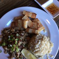Lunch plate with two entrees: sisig and lechon kawali ($15) at Nick's on Grand in South San Francisco