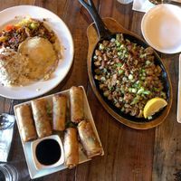 Corned beef hash, sizzling sisig, and vegetable lumpia at Nick's on Grand in South San Francisco