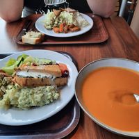 Carrot tomato soup, salad, herb mashed potatoes, fried tofu, white wine sauce at Bistro Papu ja Pata in Tampere