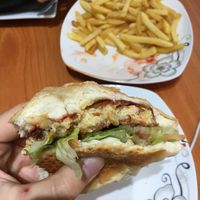 The inside of the vegan burger (deep-fried but tasty) the filling is not that big (could be more veggies inside)  at Quyet Hang in Ha Giang