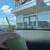 Matcha latte and the front of their shop  at Urban Beets Cafe & Juicery in Wauwatosa
