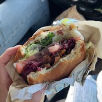 BLT burger, with some bites taken out  at Urban Beets Cafe & Juicery in Wauwatosa