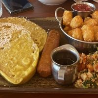 Big breakfast with vegan French toast, beyond sausage, tofu scramble and tots    at Namo Cafe Bistro in Calgary