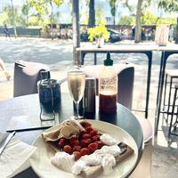 Raspberry crepes with vegan ice cream and vegan crème, and champagne by the glass   at Coffee Crepes in Paris