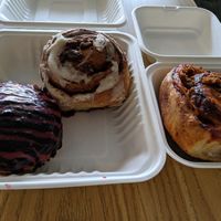 baked goods: doughnut, cinnamon swirl, pizza swirl at Fern Cafe and Bakery in Victoria