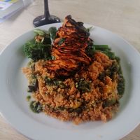 Vegan celeriac shawarma, cous cous salad, grilled green vegetables at The Den Restaurant in Hereford