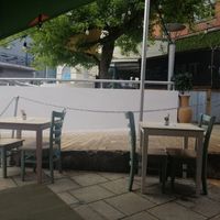 Lovely outdoor seating area at The Den Restaurant in Hereford